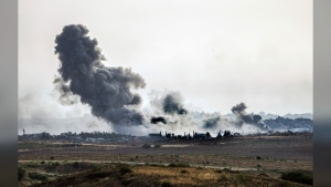 Lawyers across Canada are crying foul after Canada's immigration department asked a medical worker fleeing the war in Gaza if he'd ever treated injured Hamas soldiers. Smoke rises following an Israeli airstrike in the Gaza Strip, as seen from southern Israel, Friday, May 17, 2024. THE CANADIAN PRESS/AP-Tsafrir Abayov