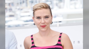 FILE - Scarlett Johansson poses for photographers at the photo call for the film "Asteroid City" at the 76th international film festival, Cannes, southern France, May 24, 2023. OpenAI plans to halt the use of one of its ChatGPT voices after some drew similarities to Johansson, who famously portrayed a fictional AI assistant in the (perhaps no longer so futuristic) film “Her.” (Photo by Joel C Ryan/Invision/AP, File)