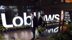 As a month-long boycott of Loblaw-owned stores wears on, small independent stores and alternative grocery options say they’re seeing a boost in traffic and sales. A man walks out through the entrance of a Loblaws store in Toronto on Thursday, May 3, 2018. THE CANADIAN PRESS/Nathan Denette