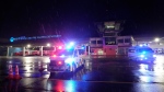 Ambulances are seen at the airport where a London-Singapore flight that encountered severe turbulence was diverted to, in Bangkok, Thailand, Tuesday, May 21, 2024. The plane apparently plummeted for a number of minutes before it was diverted to Bangkok, where emergency crews rushed to help injured passengers amid stormy weather, Singapore Airlines said Tuesday. (AP Photo/Sakchai Lalit)
