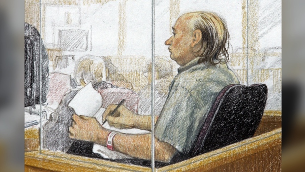 An artist's sketch Robert Pickton taking notes during the second day of his trial in B.C. Supreme Court in New Westminster, B.C., Tuesday January 31, 2006. THE CANADIAN PRESS/Jane Wolsack