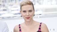 FILE - Scarlett Johansson poses for photographers at the photo call for the film "Asteroid City" at the 76th international film festival, Cannes, southern France, May 24, 2023. (Photo by Joel C Ryan/Invision/AP, File)