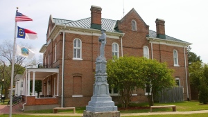 A federal lawsuit filed Tuesday seeks the removal of a Confederate monument marked as 'in appreciation of our faithful slaves' from outside of a North Carolina county courthouse. (Tyrell County Courthouse)