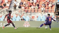 Toronto FC's Deandre Kerr scores on CS Saint Laurent goalkeeper Konstantinos Maniatis during first half Canadian Championship quarterfinal action in Toronto, on Tuesday, May 21, 2024. THE CANADIAN PRESS/Chris Young