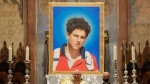 An image of 15-year-old Carlo Acutis is seen during his beatification ceremony in the St. Francis Basilica in Assisi, Italy on Oct. 10, 2020. (Gregorio Borgia / AP Photo)