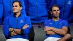 An emotional Roger Federer, left, of Team Europe sits alongside his playing partner Rafael Nadal after their Laver Cup doubles match against Team World's Jack Sock and Frances Tiafoe at the O2 arena in London, Friday, Sept. 23, 2022. (AP Photo/Kin Cheung, File)