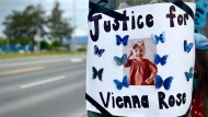 A poster reads 'Justice for Vienna' at a rally held for the toddler in Cobourg on May 25, 2024. (CTV News Toronto)