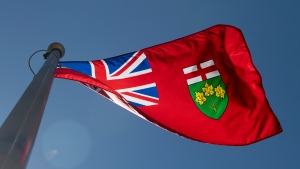 The Ontario provincial flag flies in Ottawa on Monday, July 6, 2020. (THE CANADIAN PRESS/Adrian Wyld)