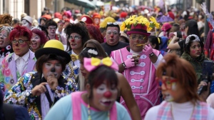 Clowns march celebrating The Day of the Peruvian Clown, in downtown Lima, Peru, Saturday, May 25, 2024. (Martin Mejia/AP Photo)
