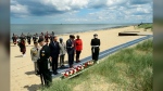 Prime Minister Justin Trudeau will travel to France next month for the 80th anniversary of D-Day. Trudeau and the Prime Minister of France Edouard Philippe take part in a wreath laying as part of the D-Day 75th Anniversary Canadian National Commemorative Ceremony at Juno Beach in Courseulles-sur-Mer, France, Thursday, June 6, 2019. THE CANADIAN PRESS/Sean Kilpatrick