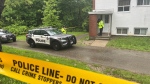 Police are seen on Cataraqui Crescent at the scene of a homicide on May 27, 2024. (Ken Enlow/ CP24) 