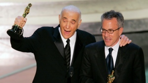 FILE - Producers Albert S. Ruddy, left, and Tom Rosenberg accept their Oscars after the film "Million Dollar Baby" won for best motion picture of the year at the 77th Academy Awards Sunday, Feb. 27, 2005, in Los Angeles. The Canadian-born producer and writer who won Oscars for “The Godfather” and “Million Dollar Baby,” died Saturday, May 25, 2024, at age 94.(AP Photo/Mark J. Terrill, File)