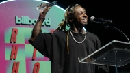 Lil Wayne collects the Hip-Hop Hall of Fame Inductee Award at Billboard R&B Hip-Hop Live, celebrating of the 50th anniversary of hip-hop, at The Novo in Los Angeles, Tuesday, Aug. 8, 2023. THE CANADIAN PRESS/AP-Chris Pizzello