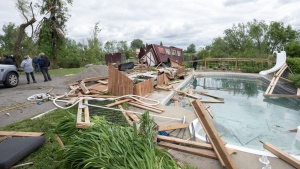 Weather damage is seen in Tres-Saint-Redempteur, Quebec, on Tuesday, May 28, 2024. Environment Canada says the tornado that hit west of Montreal on Monday generated maximum wind speeds of about 155 kilometres per hour. THE CANADIAN PRESS/Ryan Remiorz