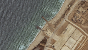 This Satellite image provided by Maxar Technologies shows the view of remaining section of the temporary pier on Wednesday, May 29, 2024 off Gaza. (Maxar Technologies via AP)