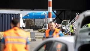 Dutch emergency services attend the incident on Wednesday. (Michel van Bergen / EPA-EFE / Shutterstock via CNN Newsource)