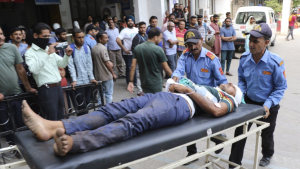 A man injured in a bus accident is brought to a hospital in Jammu, India, Thursday, May 30, 2024.  (AP Photo)