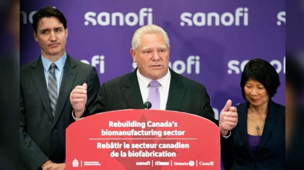 Ontario Premier Doug Ford has suggested immigrants are to blame for the shooting of an empty Jewish school in Toronto over the weekend despite police saying they have no information on the suspects. Ford, centre, delivers remarks while being flanked by Prime Minister Justin Trudeau, left, and Toronto Mayor Olivia Chow, right, during a press conference in the facilities of vaccine producer Sanofi, in Toronto on Thursday, May 30, 2024. THE CANADIAN PRESS/Arlyn McAdorey
