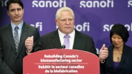 Premier Doug Ford, centre, delivers remarks while being flanked by Prime Minister Justin Trudeau, left, and Toronto Mayor Olivia Chow, right, during a press conference in the facilities of vaccine producer Sanofi, in Toronto on Thursday, May 30, 2024. THE CANADIAN PRESS/Arlyn McAdorey