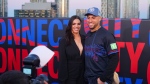 George Springer speaks to reporters at a release party for the Toronto Blue Jays' City Connect jerseys on Thursday night alongside wife Charlise Castro. He told reporters the team first saw the design last year, when it was 'in its infancy stage' and the reveal has been 'a long time coming.'