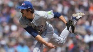 Toronto Blue Jays pitcher Jordan Romano throws against the Detroit Tigers in the eighth inning of a baseball game, Saturday, May 25, 2024, in Detroit. The Toronto Blue Jays placed closer Romano on the 15-day injured list Saturday due to right elbow inflammation. THE CANADIAN PRESS/AP-Paul Sancya