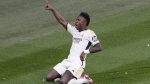Real Madrid's Vinicius Junior celebrates after scoring his side's second goal during the Champions League final soccer match between Borussia Dortmund and Real Madrid at Wembley stadium in London, Saturday, June 1, 2024. (AP Photo/Alastair Grant)