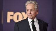 FILE - Michael Douglas arrives at the 71st Primetime Emmy Awards on Sunday, Sept. 22, 2019, at the Microsoft Theater in Los Angeles. Douglas on Sunday, June 2, 2024, paid a solidarity visit to an Israeli kibbutz that was hit hard in the Oct. 7, 2023, Hamas attack that sparked Israel’s war against the Islamic militant group. Douglas met with members of Kibbutz Be’eri and visited burnt-out homes destroyed in the attack. (Photo by Richard Shotwell/Invision/AP, File)