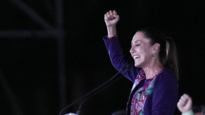 President-elect Claudia Sheinbaum addresses supporters at the Zocalo, Mexico City's main square early Monday, June 3, 2024. (AP Photo/Marco Ugarte)