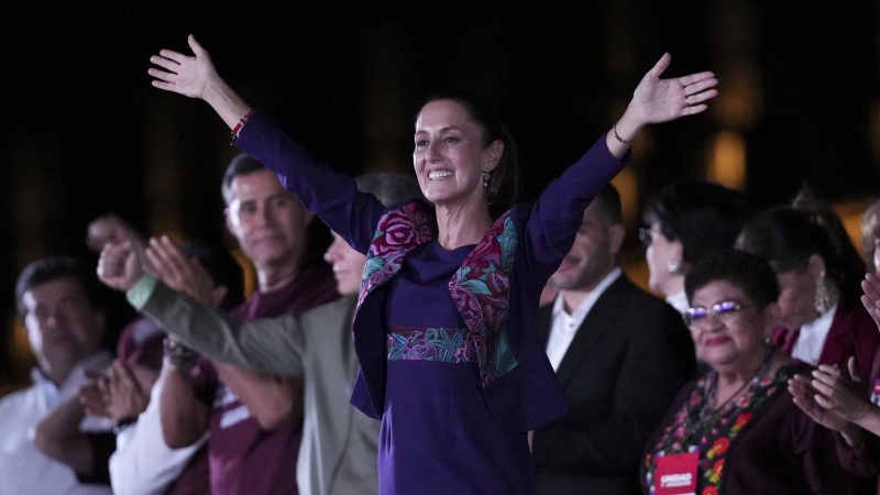 President-elect Claudia Sheinbaum addresses supporters at the Zocalo, Mexico City's main square, after the National Electoral Institute announced she held an irreversible lead in the election, early Monday, June 3, 2024. (AP Photo/Marco Ugarte)
