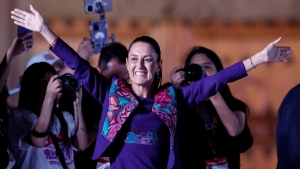 Claudia Sheinbaum waves at supporters in the Zocalo plaza in Mexico City, Mexico on June 3. (Daniel Becerril / Reuters / CNN Newsource)
