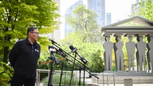 Grassy Narrows Chief Rudy Turtle gives remarks at a press conference where he announced intention to litigate against the government over contamination of Grassy Narrows, in Toronto on Tuesday, June 4, 2024. THE CANADIAN PRESS/Christopher Katsarov