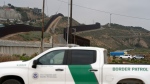 A Border Patrol vehicle sits near border walls separating Tijuana, Mexico, from the United States, Tuesday, June 4, 2024, in San Diego. (Gregory Bull / AP Photo)