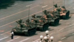 Jeff Widener's iconic "Tank Man" photo on June 5, 1989, showing an unidentified man standing in front of a column of tanks after the Tiananmen Square crackdown in Beijing, China. (Jeff Widener / The Associated Press)