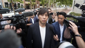 Ippei Mizuhara, the former interpreter for the Los Angeles Dodgers baseball star Shohei Ohtani, arrives at federal court in Los Angeles, Tuesday, June 4, 2024. Mizuhara is scheduled to plead guilty Tuesday to bank and tax fraud in a sports betting case where he is expected to admit to stealing nearly $17 million from the Japanese baseball player. (AP Photo/Damian Dovarganes)