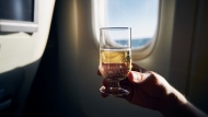 Sleep on a plane is worse in quality and quantity after drinking alcohol, according to a new study. (Chalabala/iStockphoto/Getty Images via CNN Newsource)