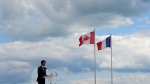 Prime Minister Justin Trudeau delivers a speech on 75th Anniversary of D-Day at Juno Beach in Courseulles-Sur-Mer, France on Thursday, June 6, 2019. Prime Minister Justin Trudeau is on his way to Normandy, France, to mark the 80th anniversary of D-Day. THE CANADIAN PRESS/Sean Kilpatrick