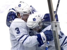 Toronto Maple Leafs Dion Phaneuf (3) and Mikhail Grabovski celebrate after defeating the Atlanta Thrashers in overtime of an NHL hockey game Thursday, March 25, 2010 in Atlanta. (AP Photo/John Bazemore)