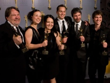 The award winners from the Best Motion Picture "Polytechnique" (from left) Don Carmody (producer) Karine Vanasse (Best Actress) Natalie-Brigitte Bustos (producer), Maxime R�millard (producer), Director Denis Villeneuve (Achievement in Direction Award) and Maxim Gaudette (Best Supporting Actor) pose for a photo back stage at the 30th annual Genie Awards after the film collected nine Genies on Monday April 12, 2010. (THE CANADIAN PRESS/Chris Young)