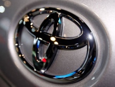 In this March 31, 2010 file photo, the Toyota logo is seen on a car displayed at the New York International Auto Show in New York. (AP / Seth Wenig, File)