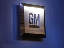 In this Jan. 12, 2009 file photo, the General Motors logo is seen on display at the North American International Auto Show in Detroit. (AP Photo/Paul Sancya, File)