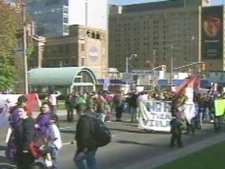 First Nations groups gather near Queen's Park on Thursday afternoon in a protest against the way the Harmonized Sales Tax will affect their community.