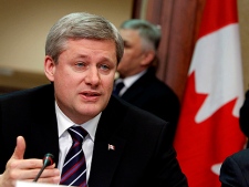 Canadian Prime Minister Stephen Harper, left, speaks during an EU-Canada summit at the EU Council building in Brussels, Wednesday, May 5, 2010. The EU and Canada will look toward expanding free trade and to focus on accelerating the international economic recovery.(AP Photo/Virginia Mayo)