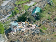 A landslide in Saint-Jude, Que. is shown fmor the air on Tuesday, May 11, 2010 as rescue crews search the Pr�fontaine family home for missing persons. (THE CANADIAN PRESS/Graham Hughes)