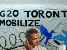 Anti-poverty activist John Clark, an organizer for the Ontario Coalition Against Poverty, takes part in the Toronto Community Mobilization Network press conference in Toronto on Thursday, May 20, 2010 which opposes the G8/G20. (THE CANADIAN PRESS/Nathan Denette)