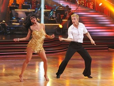 In this image provided by ABC Nicole Scherzinger  and her partner Derek Hough perform the Argentine Tango Tuesday May 25, 2010. (AP Photo/ABC/Adam Larkey)