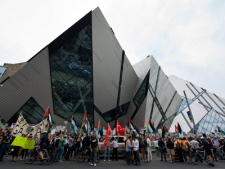 Protesters rally in front of the Israeli consulate in Toronto on Monday, May 31, 2010.