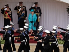 Britain's Queen Elizabeth II attends the Armed Forces Parade and Muster in Windsor Castle, Windsor, England, Saturday, May 19, 2012. More than 2,500 troops paraded before the Queen and the Duke of Edinburgh. Sailors, soldiers and Royal Air Force personnel from nearly all areas of the British Armed Forces were represented in the main body of the parade, together with a tri-Service Guard of Honour and six military bands. (AP Photo/Lefteris Pitarakis, pool)
