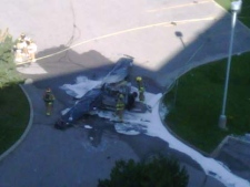 An employee of an adjacent office building took this photograph of the plane crash in York Region from the eighth floor on June 20, 2010. 