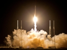 The Falcon 9 SpaceX rocket lifts off from space launch complex 40 at the Cape Canaveral Air Force Station in Cape Canaveral, Fla., early Tuesday, May 22, 2012. This launch marks the first time a private company sends its own rocket to deliver supplies to the International Space Station. (AP Photo/John Raoux)