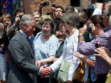 Prince Charles does a walk about as he arrives at a distillery in Toronto on Tuesday, May 22, 2012. (THE CANADIAN PRESS/Paul Chiasson)